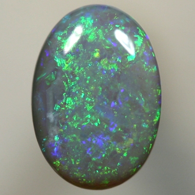 SOLID SEMI BLACK OPAL Sparkles of bright greens over blue